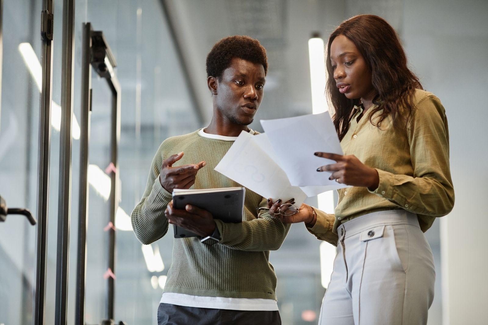 two professionals reviewing a sales proposal