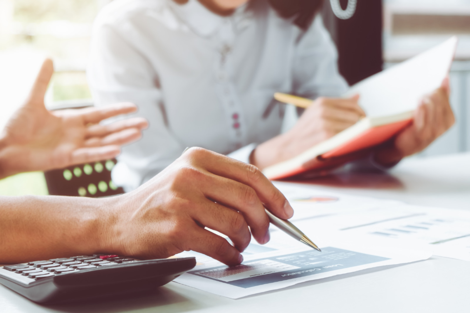 two people going over financial reports