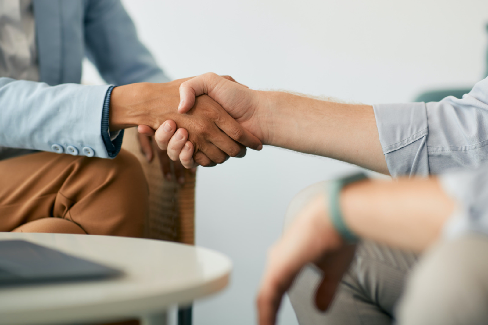 two people shaking hands