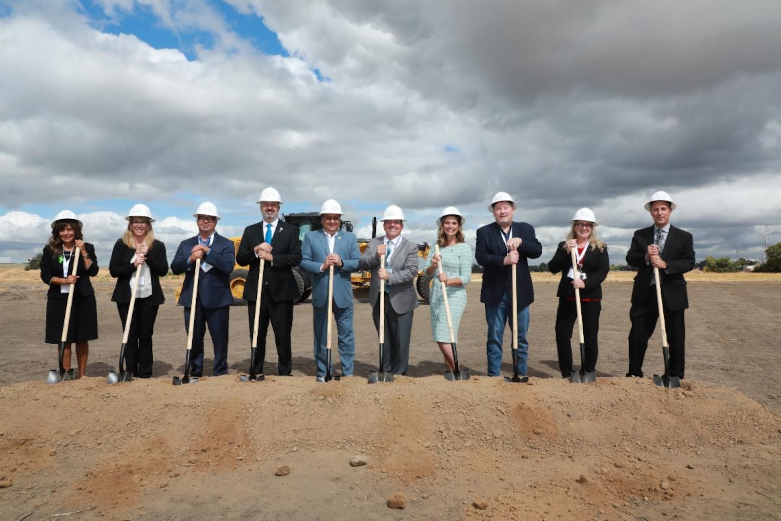 San Joaquin County board standing with shovels in hand