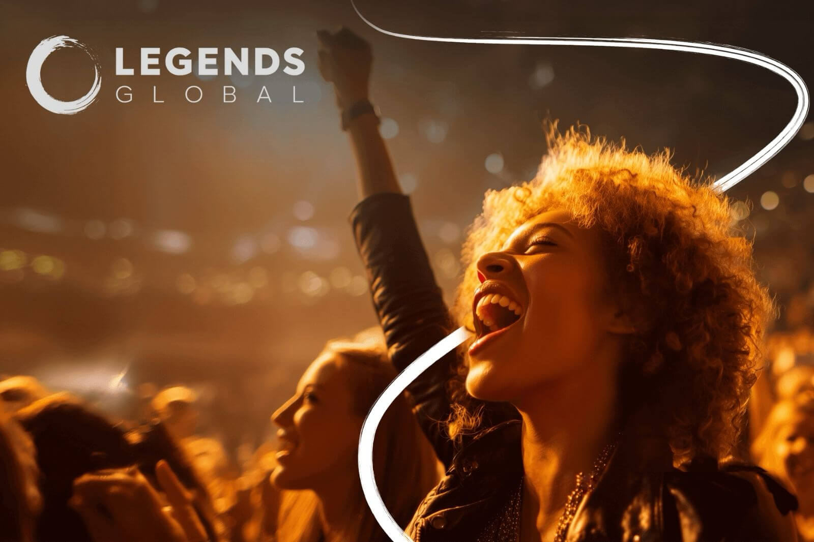 Woman at a concert singing with her hand raised in the air